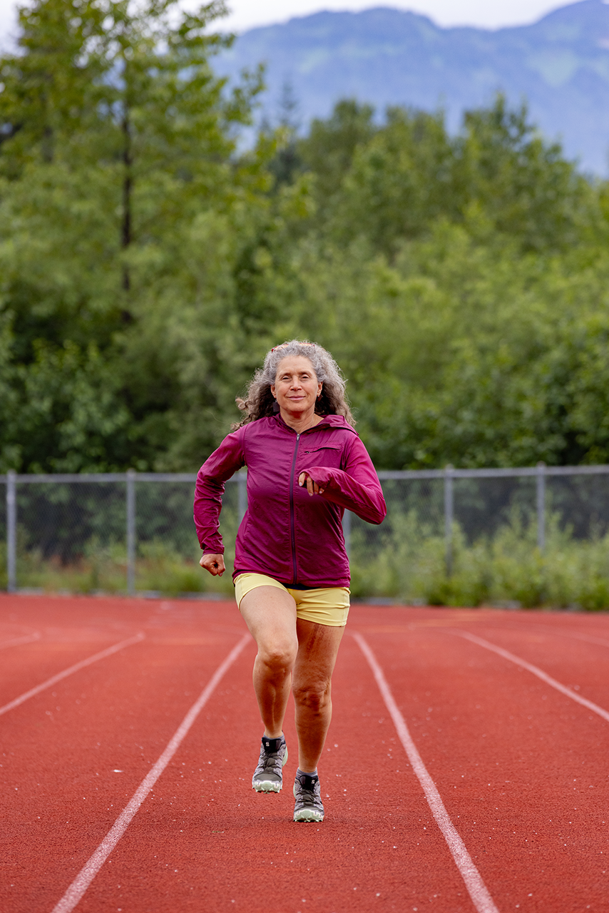 Runner training on an outdoor track